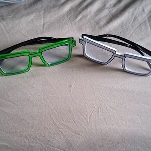You Get Both Green and Black And White Novelty Glasses